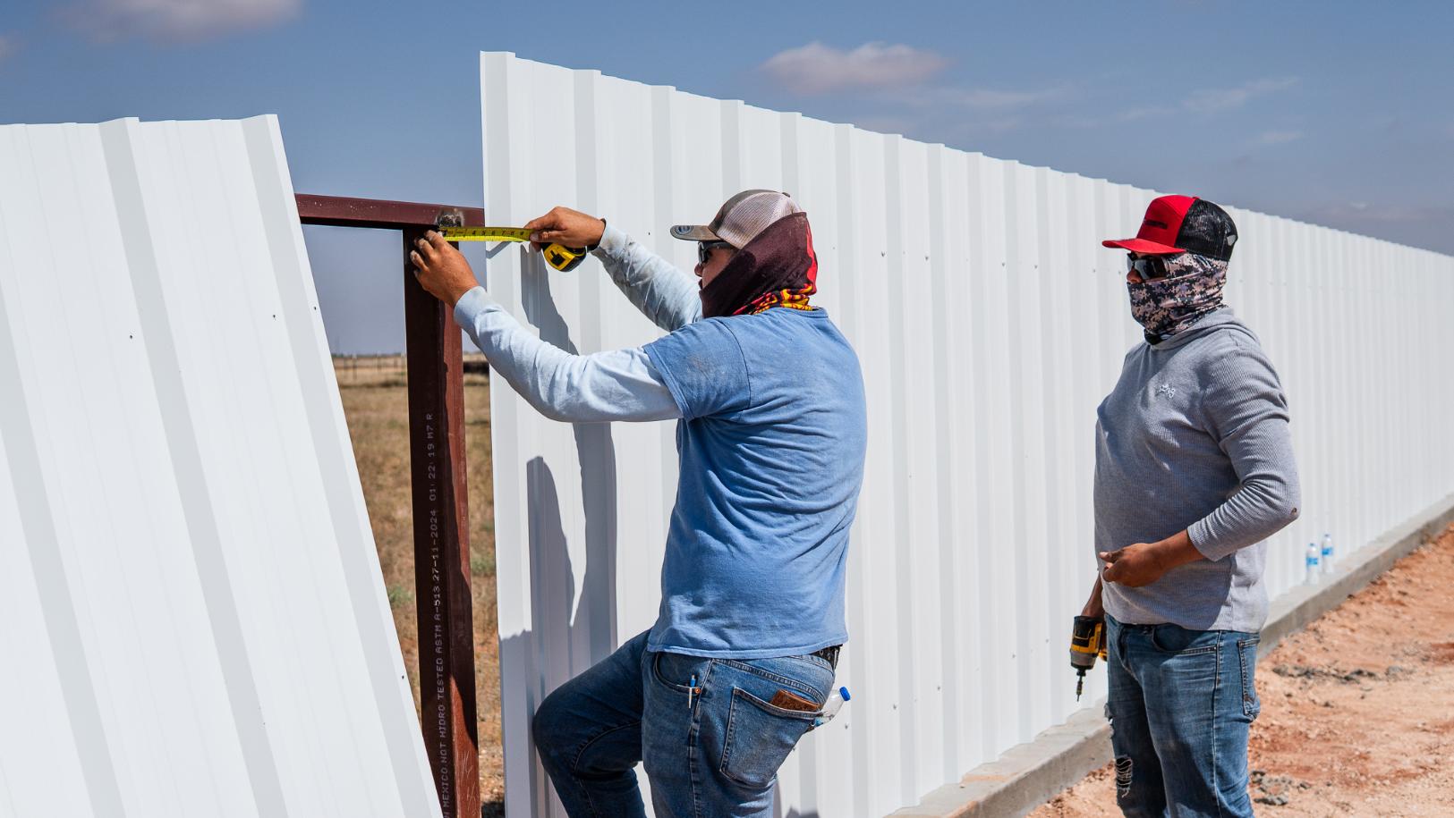 Custom metal fence with panels installed by Best In The West Construction in Midland, Texas